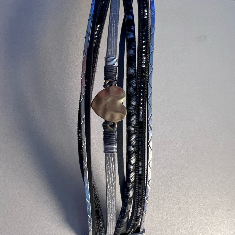 Boho stacked faux leather bracelet with gold metal heart.